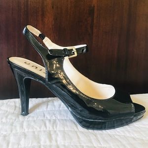 Open toe patent leather pumps